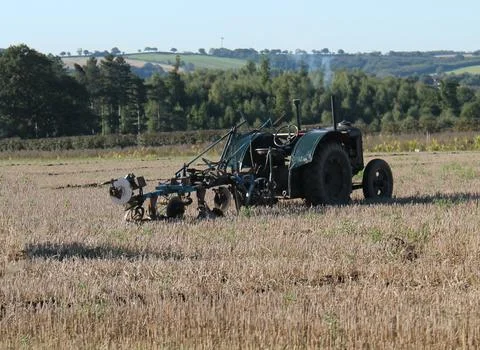 Tractor and Plough. Stock Photos