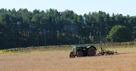 Tractor and Plough. Stock Photos
