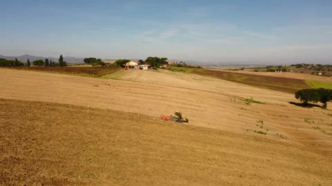 Tractor and plow Stockbeeldmateriaal 140291070