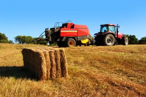 Tractor and straw Stock Photos