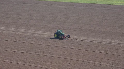 Tractor in the arable field in Germany Stock Footage 151971246