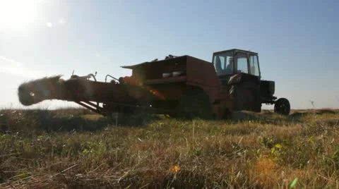 Tractor baler machine in the field of Ukraine Stock Footage 18196752