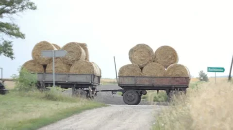 Tractor with bales Stock Footage 11496630