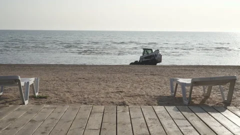 Tractor on the beach Stock Footage 142719990