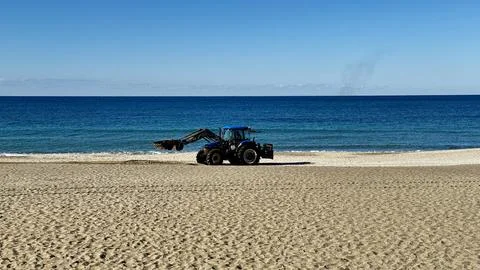 Tractor beach ocean Stock Photos