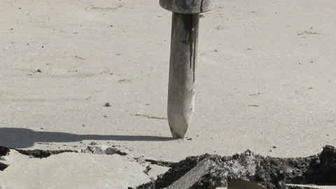 Tractor break down asphalt with hydraulic pneumatic hammer. Stock Footage 131960105