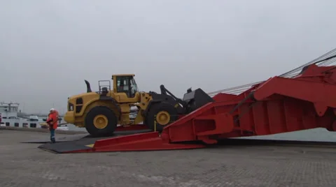 Tractor on Cargo Carrier bridge Video stock 32212447