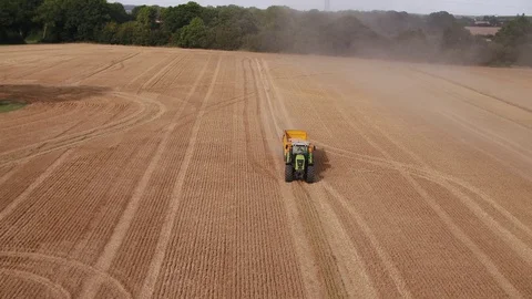 Tractor carrying wheat Stock Footage