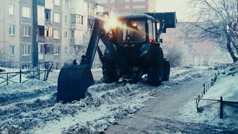 Tractor cleaning the road from the snow. Stock Footage 101718302