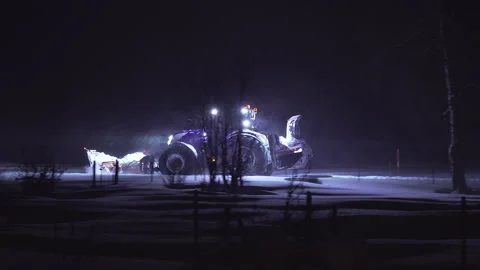 Tractor Cleaning Snow at Night in A Snowfall Stock Footage 146871266