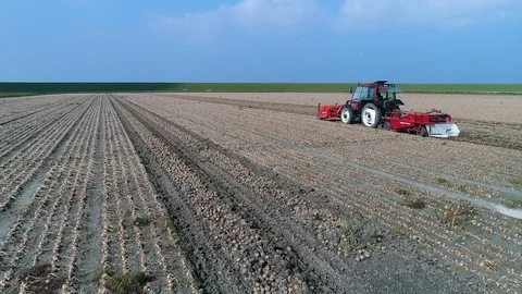 Tractor combination on sunny day fly over Stock-Footage 102841580