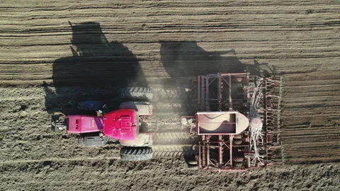 Tractor in conjunction with a sowing unit Video stock 163897019
