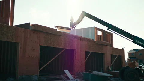 Tractor construction activity on building site during sunny day Stock Footage 310160654