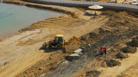 Tractor Construction on the beach Stock Footage 46607308