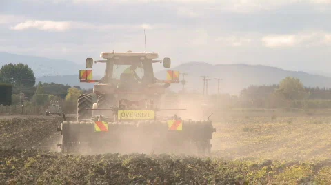 Tractor cultivates Stock Footage 867598