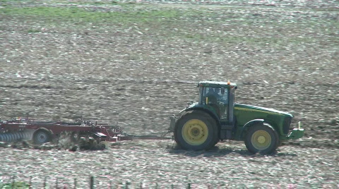 Tractor cultivating 3 Stock Footage