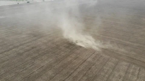 Tractor cultivating field at spring Stock Footage 127597327