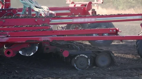 Tractor cultivating land Stock Footage 80438569
