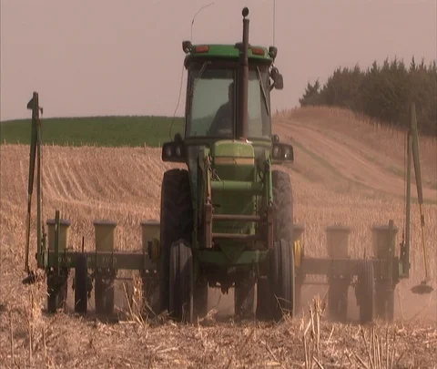 Tractor cutting down stubble and chaff in wheat field. Stock Footage 86748632