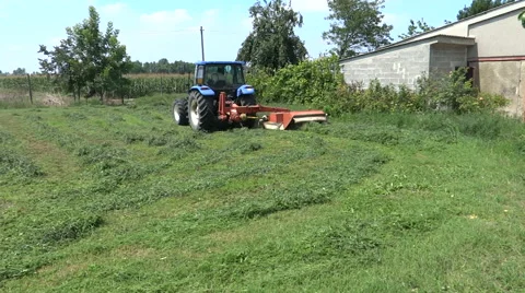 Tractor cutting the grass Stock Footage 68321006