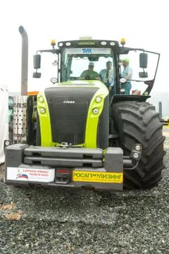 Tractor demonstration on platform open-air Stock Photos