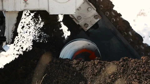 Tractor digs a trench Stock Footage 89071097