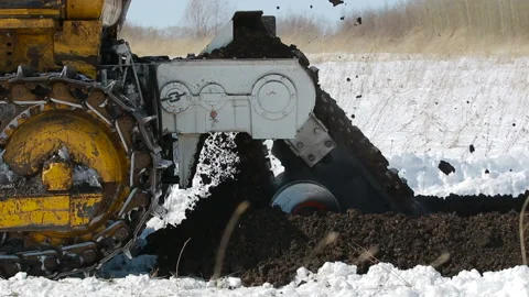 Tractor digs a trench Stock Footage 89072830