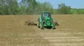 Tractor Discing Field 01 HD Footage