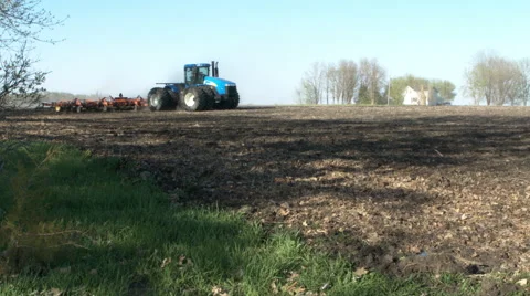 Tractor disking Stock Footage 52524941
