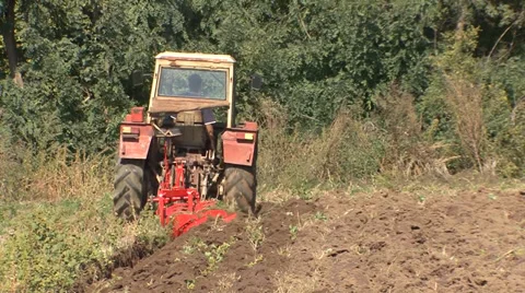 Tractor doing furrow for planting Stock-Footage 35453069