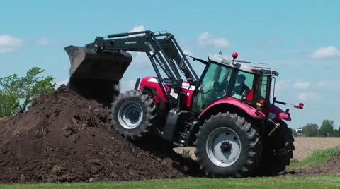 Tractor doing landscaping work Stock Footage 50363219