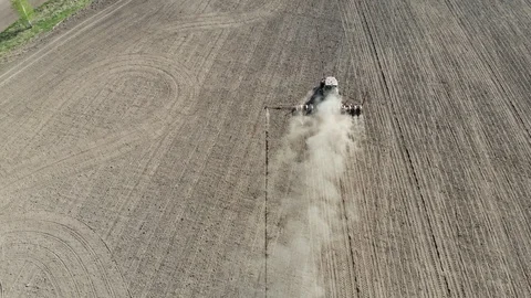 Tractor doing stubble tillage in the field Stock Footage 111900489