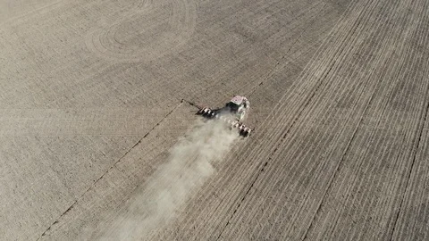 Tractor doing stubble tillage in the field Stock Footage 111913478