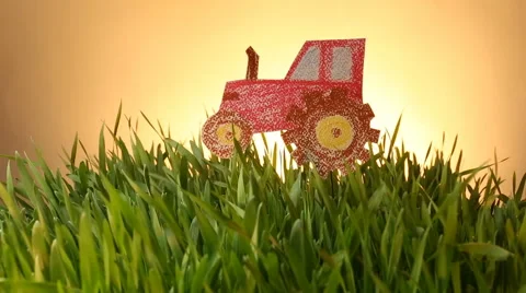 Tractor drawn icon on Grass green summer background. Vídeo Stock 62384097