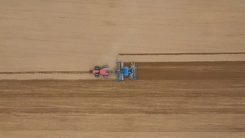 Tractor Drill Plows And Seeder Plants Seeds Of Grain Crops In Agricultural Field 库存影片 122498510