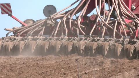 Tractor drilling seeding crops at farm. Stock Footage 282197624