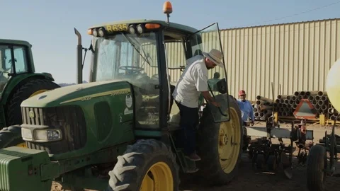 Tractor Driver's has Sore Back after a Long Day Stock Footage 95614078