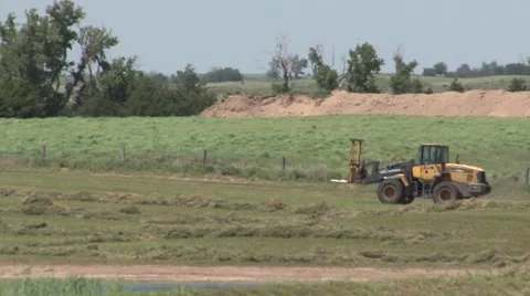 Tractor Driving Across Field Stock Footage 40451229