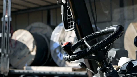 Tractor driving inside view. Tractor cabin. Steering wheel hands.Driver's cab at 動画素材 120134206