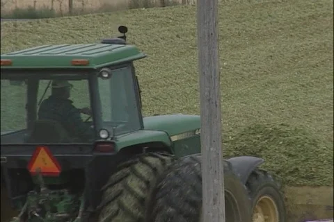 Tractor Driving Through Feed Stock Footage 93055961