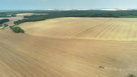 Tractor in Drought Struck Field, Leaving Dust Trail - Haute Marne, France 4K Stock Footage 259847728