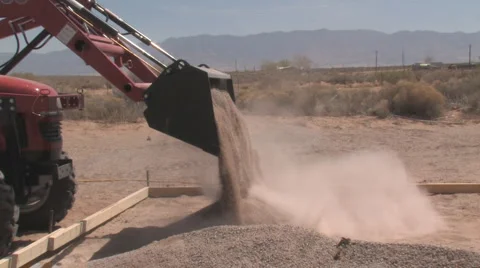 Tractor Dumping Gravel Inside Foundation Forms Stock Footage 3175036