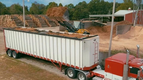Tractor Dumping into Trailer 60fps Stock Footage 119335360