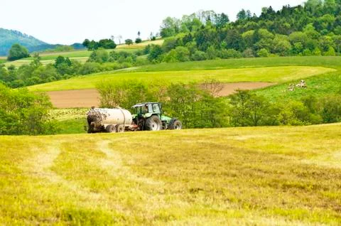 Tractor with dung Stock Photos