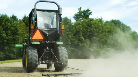 Tractor In Dusty Field Stock Footage 130144886