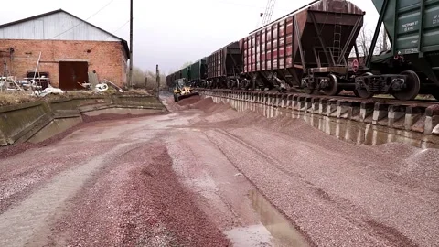 The tractor equalizes the rubble on the ground. Stock Footage 196087734