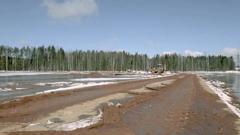 Tractor-excavator clears construction site Stock Footage 80309042