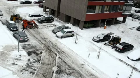 Tractor excavator work clean winter snow block house parking lot Stock Footage 21263480