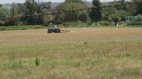 Tractor on Farm 2 Stock Footage 793599
