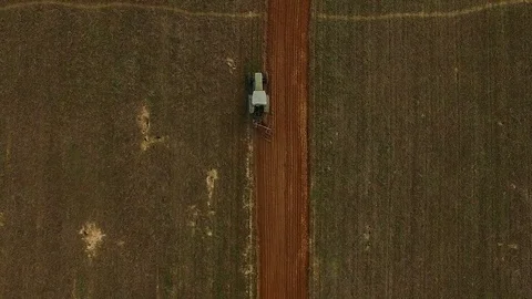 Tractor on the field aerial view Video stock 84226936